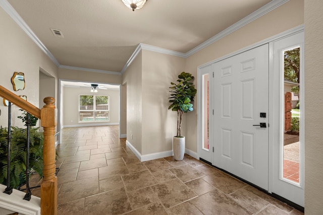3312 John Ct N, Hurst, TX 76054 - foyer with ornamental molding, ceiling fan, stairs, and stone tile flooring