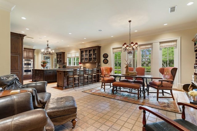 3048 Concord Pl, Tyler, TX 75701 - living room with a chandelier, recessed lighting, ornamental molding, and light tile patterned floors