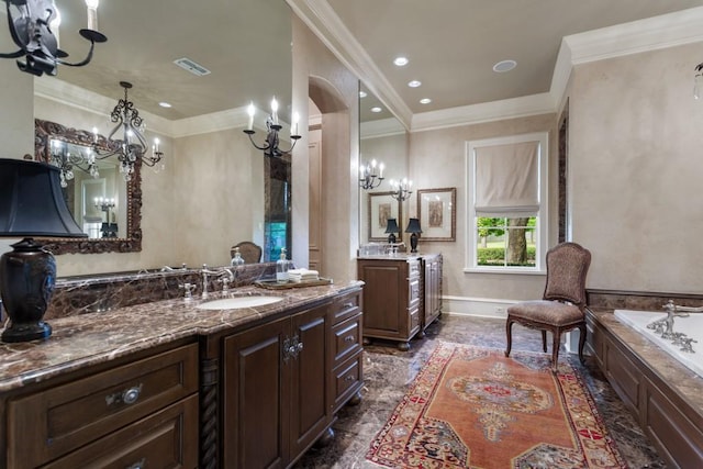 3048 Concord Pl, Tyler, TX 75701 - bathroom featuring a chandelier, two vanities, a bath, ornamental molding, and recessed lighting