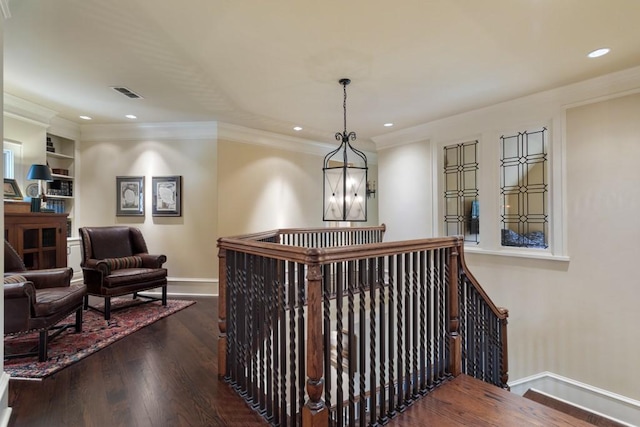 3048 Concord Pl, Tyler, TX 75701 - hall with an upstairs landing, dark wood-style floors, recessed lighting, and ornamental molding