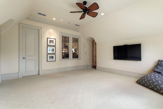 3048 Concord Pl, Tyler, TX 75701 - living area with carpet, a ceiling fan, vaulted ceiling, arched walkways, and recessed lighting