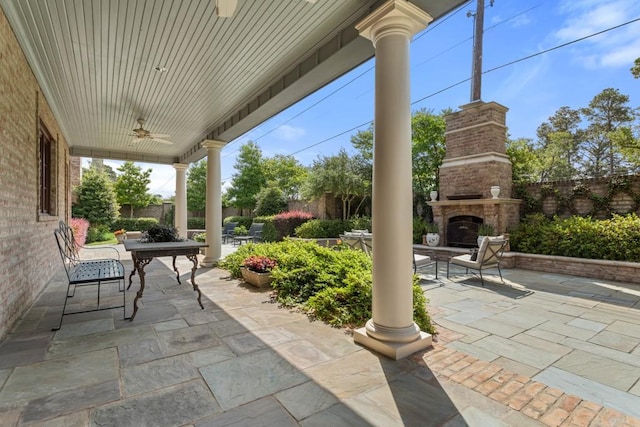 3048 Concord Pl, Tyler, TX 75701 - view of patio / terrace featuring an outdoor brick fireplace, ceiling fan, and outdoor dining area