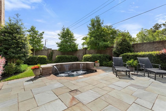 3048 Concord Pl, Tyler, TX 75701 - fenced backyard featuring a hot tub and a patio area