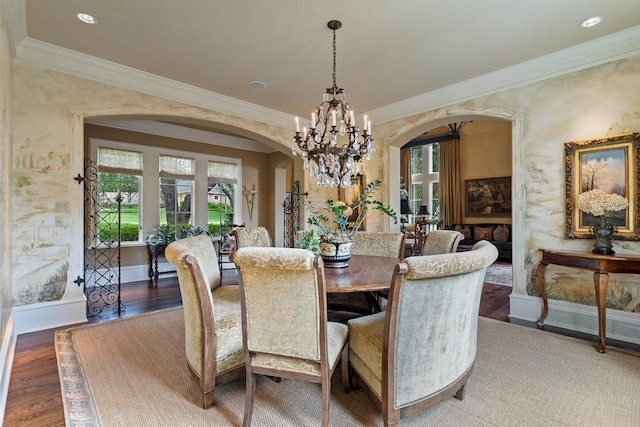 3048 Concord Pl, Tyler, TX 75701 - dining room featuring arched walkways, ornamental molding, a chandelier, plenty of natural light, and light wood-style flooring