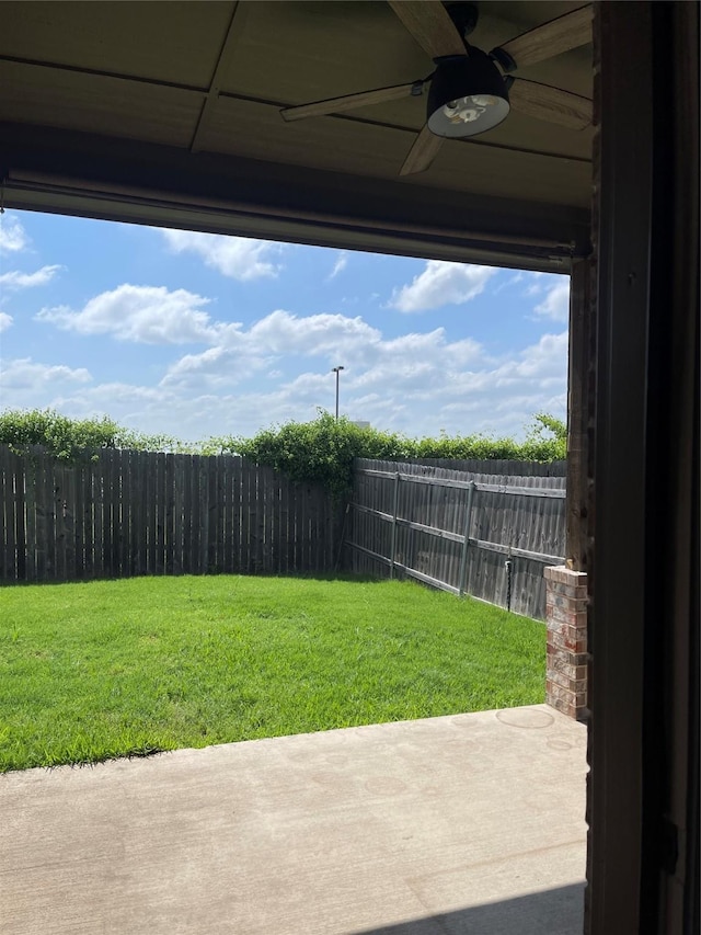 2314 Peggeys Cv, Sherman, TX 75092 - fenced backyard featuring a ceiling fan and a patio