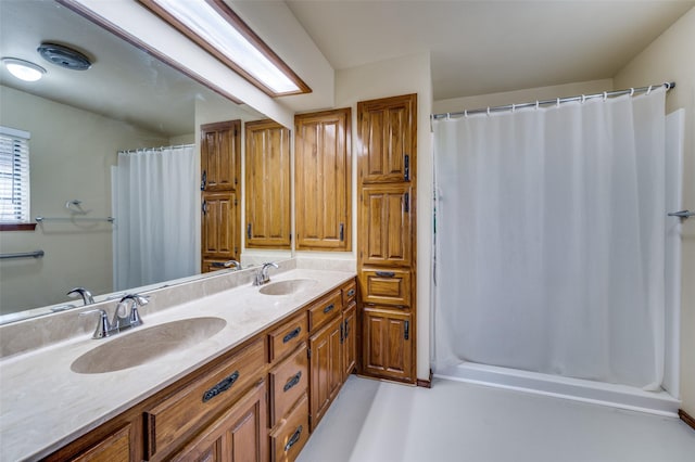 2917 Fladger St, Denton, TX 76207 - full bathroom with double vanity and a shower with shower curtain