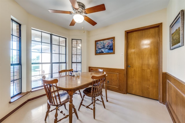 2917 Fladger St, Denton, TX 76207 - dining room featuring a wainscoted wall and ceiling fan