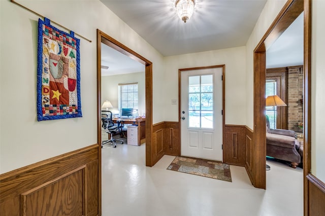 2917 Fladger St, Denton, TX 76207 - entrance foyer with wainscoting and finished concrete flooring