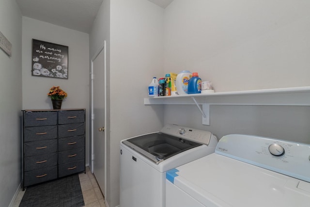 2625 Hudson Xing, Mckinney, TX 75072 - washroom featuring washer and dryer and light tile patterned floors