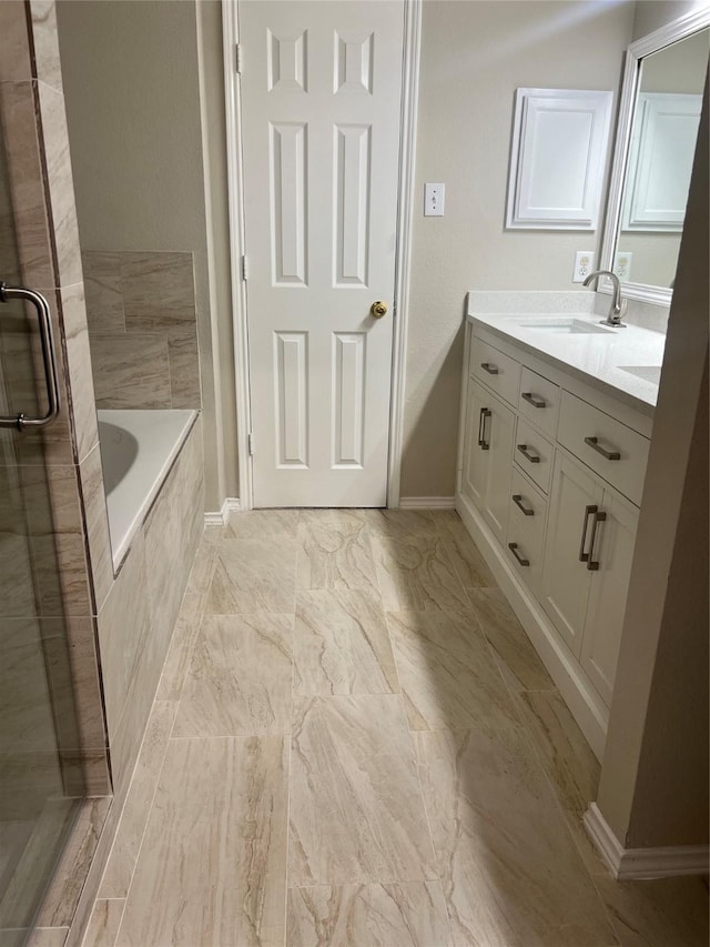 2625 Hudson Xing, Mckinney, TX 75072 - full bath with double vanity, a bath, an enclosed shower, and marble finish flooring