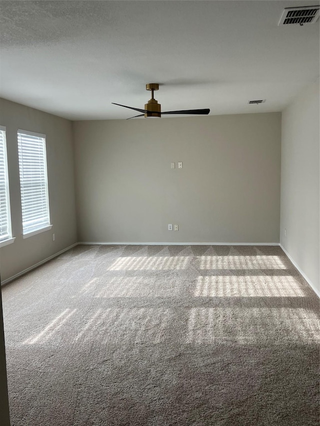2625 Hudson Xing, Mckinney, TX 75072 - carpeted empty room featuring a ceiling fan and baseboards