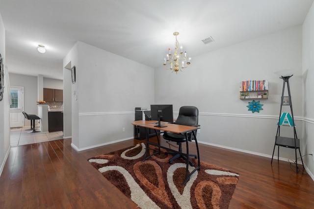 2625 Hudson Xing, Mckinney, TX 75072 - home office featuring wood finished floors and a chandelier