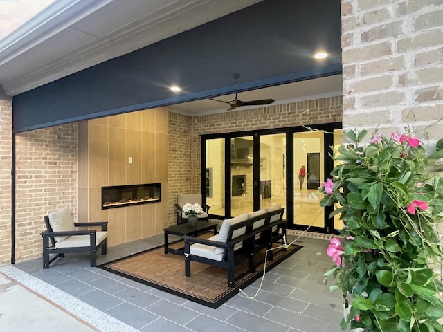 320 W Highland St, Southlake, TX 76092 - view of patio with a glass covered fireplace and a ceiling fan