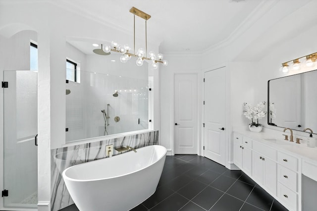 320 W Highland St, Southlake, TX 76092 - full bathroom featuring a stall shower, vanity, a freestanding tub, ornamental molding, and tile patterned flooring