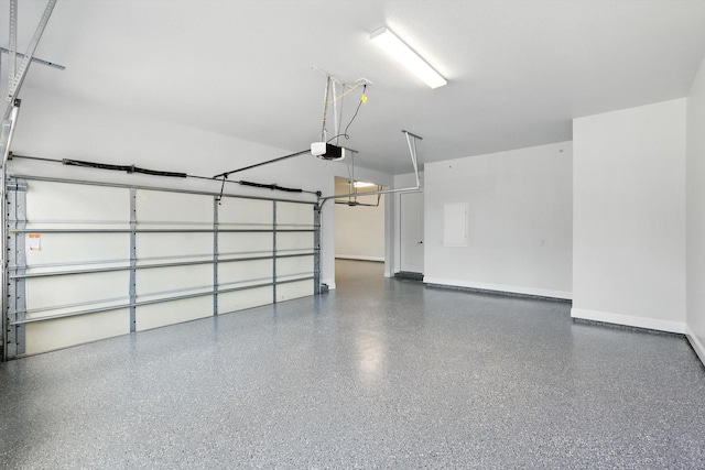 320 W Highland St, Southlake, TX 76092 - garage with a garage door opener and baseboards