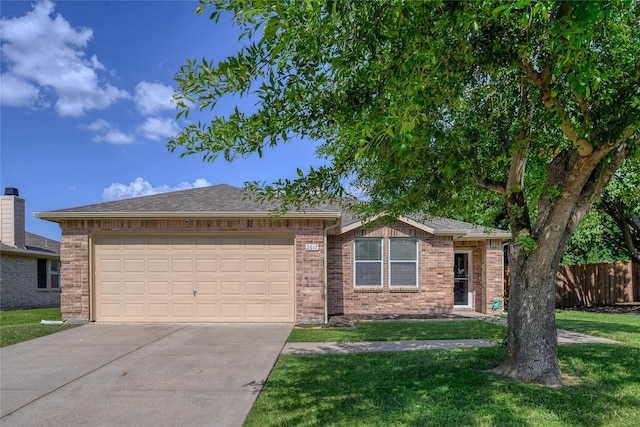 2617 S Wavecrest, Little Elm, TX 75068 - single story home featuring concrete driveway, an attached garage, and brick siding