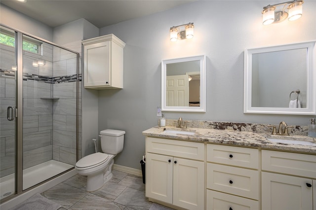 308 N 4th St, Gunter, TX 75058 - bathroom with double vanity, a stall shower, and marble finish floors