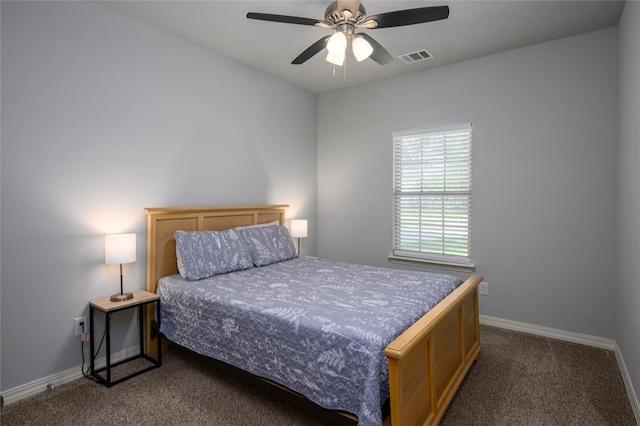 308 N 4th St, Gunter, TX 75058 - bedroom with dark carpet and ceiling fan