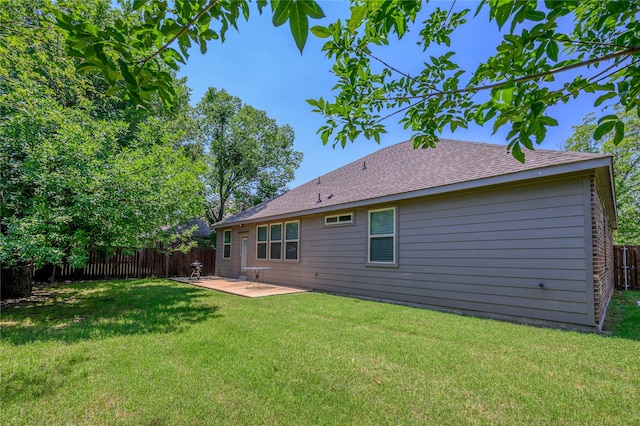308 N 4th St, Gunter, TX 75058 - rear view of property featuring a fenced backyard, a patio, and a shingled roof