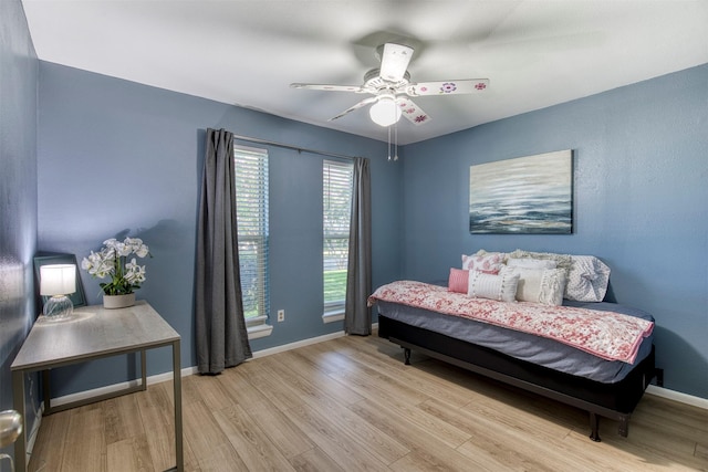 6005 Frontier Ln, Plano, TX 75023 - bedroom with wood finished floors and ceiling fan