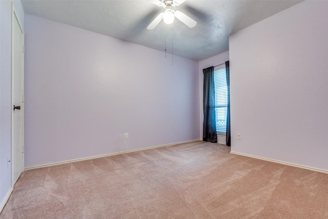 1301 Colmar Dr, Plano, TX 75023 - carpeted spare room featuring a ceiling fan and baseboards