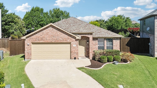 3900 Ironstone Ln, Mckinney, TX 75070 - view of front of house with brick siding, a garage, concrete driveway, and a shingled roof