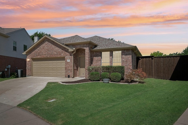 3900 Ironstone Ln, Mckinney, TX 75070 - view of front of property featuring brick siding, driveway, a garage, and a shingled roof