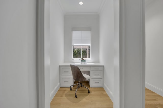 6819 Park Ln, Dallas, TX 75225 - office featuring built in study area, ornamental molding, and light wood-type flooring