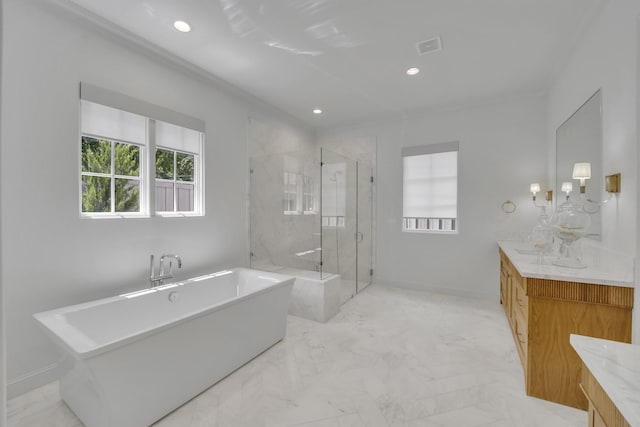 6819 Park Ln, Dallas, TX 75225 - bathroom featuring vanity, a marble finish shower, a freestanding bath, recessed lighting, and marble look tiles