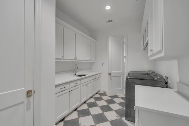 6819 Park Ln, Dallas, TX 75225 - laundry area with cabinet space, light floors, washer and clothes dryer, and recessed lighting
