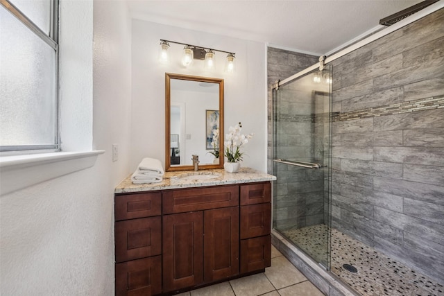 321 Malero Dr, Grand Prairie, TX 75051 - full bath with a shower stall, vanity, and tile patterned flooring