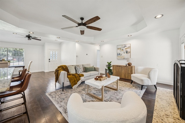 321 Malero Dr, Grand Prairie, TX 75051 - living area featuring a ceiling fan, a tray ceiling, recessed lighting, and dark wood-type flooring