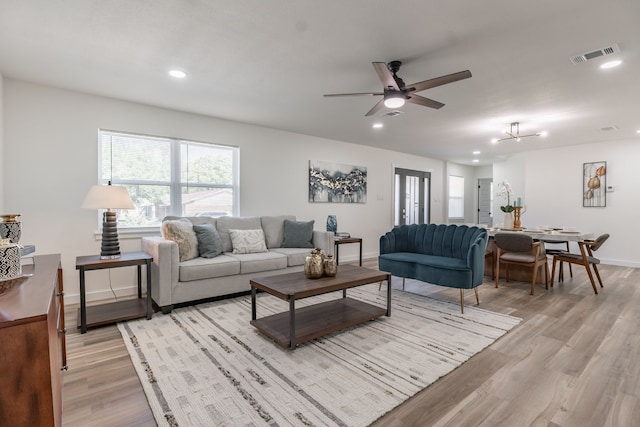 1105 Trellis Dr, Garland, TX 75040 - living area featuring light wood-type flooring, ceiling fan, and recessed lighting