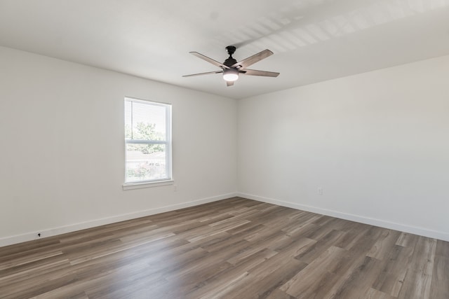 1105 Trellis Dr, Garland, TX 75040 - empty room featuring ceiling fan and wood finished floors