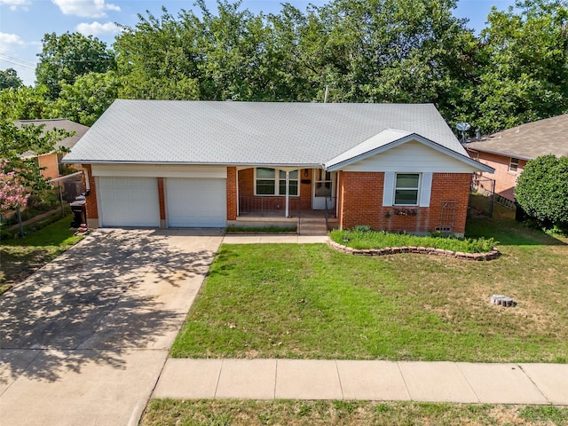 903 20th St, Plano, TX 75074 - ranch-style house with brick siding, an attached garage, driveway, and a porch