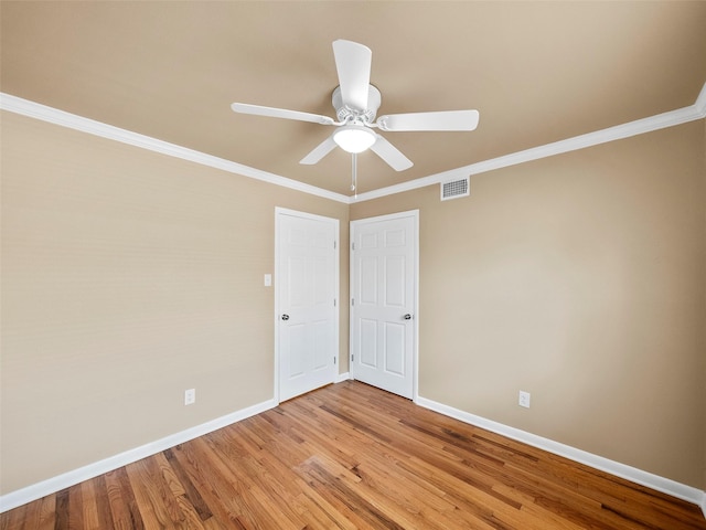 903 20th St, Plano, TX 75074 - unfurnished room featuring ceiling fan, light wood-style flooring, and ornamental molding