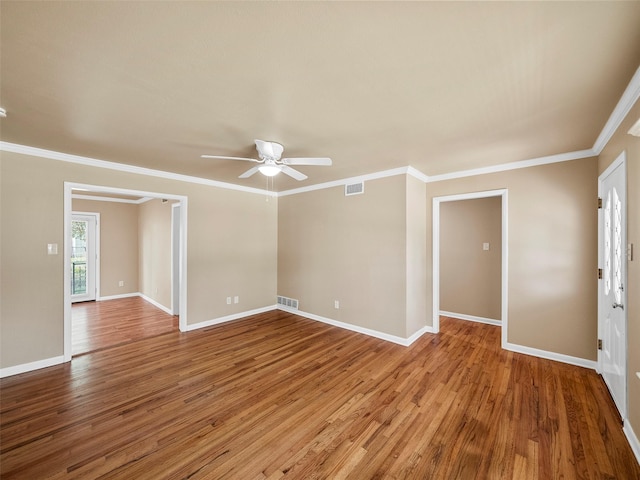 903 20th St, Plano, TX 75074 - unfurnished room featuring a ceiling fan, wood finished floors, and crown molding