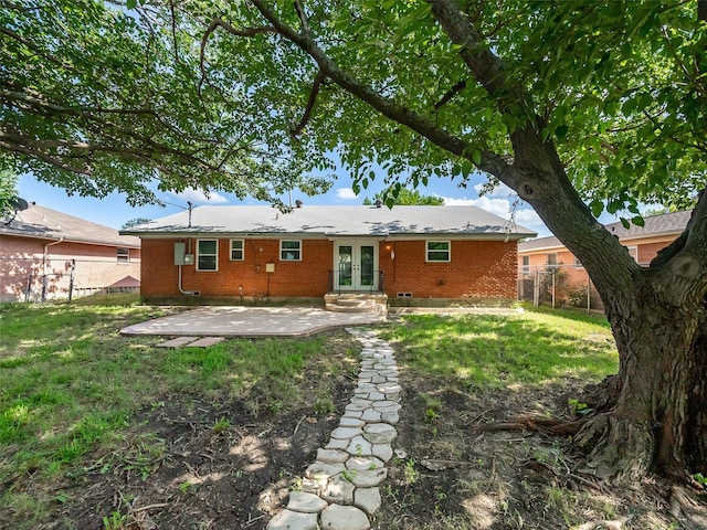 903 20th St, Plano, TX 75074 - rear view of house with french doors, a patio, a fenced backyard, and brick siding