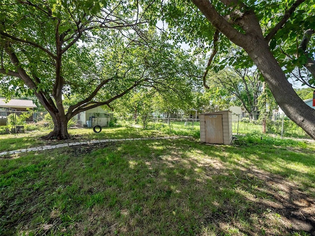 903 20th St, Plano, TX 75074 - fenced backyard featuring a shed