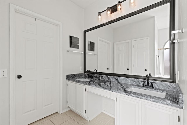 6749 Misty Hollow Dr, Plano, TX 75024 - bathroom featuring double vanity and tile patterned floors