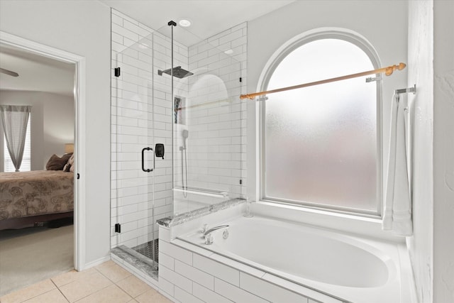 6749 Misty Hollow Dr, Plano, TX 75024 - full bathroom with ensuite bath, a shower stall, a bath, and tile patterned flooring