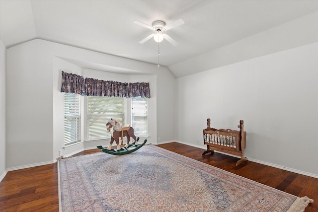 6749 Misty Hollow Dr, Plano, TX 75024 - sitting room with vaulted ceiling, a ceiling fan, and wood finished floors