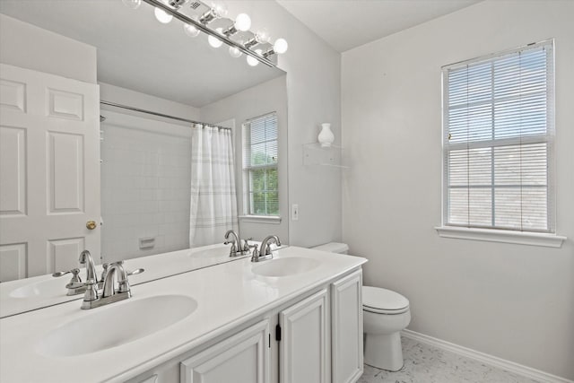 6749 Misty Hollow Dr, Plano, TX 75024 - full bathroom featuring double vanity and a shower with shower curtain