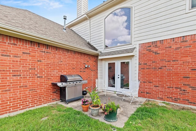 6749 Misty Hollow Dr, Plano, TX 75024 - view of patio / terrace with grilling area and french doors