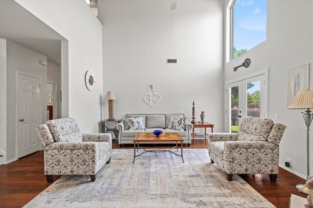 6749 Misty Hollow Dr, Plano, TX 75024 - living room featuring a high ceiling and wood finished floors