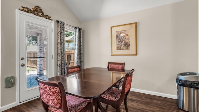 801 Lake Forest Trl, Little Elm, TX 75068 - dining room featuring lofted ceiling and dark wood-type flooring