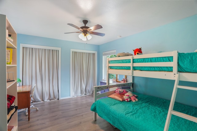 1714 O Pl, Plano, TX 75074 - bedroom featuring wood finished floors and a ceiling fan