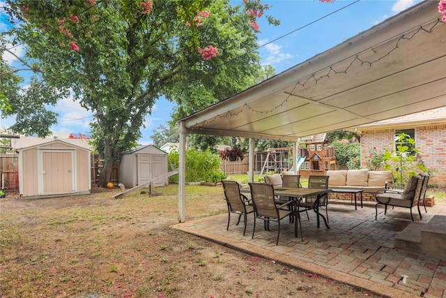 1714 O Pl, Plano, TX 75074 - view of yard featuring a storage shed, a playground, outdoor lounge area, and a patio area