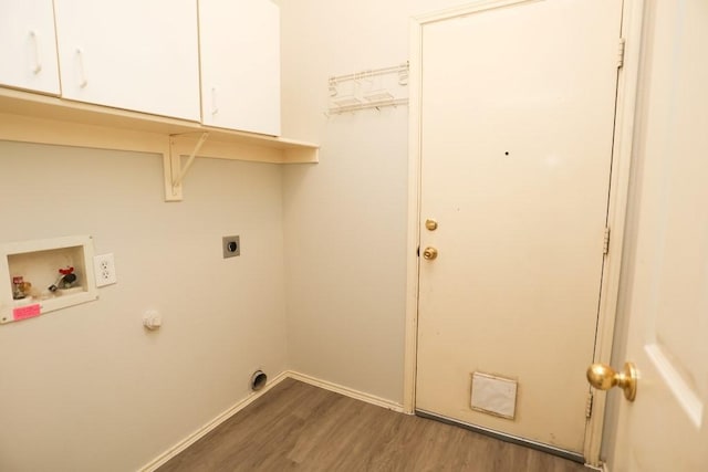 10606 Greenbriar Ln, Rowlett, TX 75089 - laundry room featuring cabinet space, washer hookup, wood finished floors, and electric dryer hookup