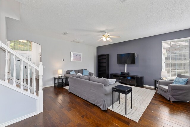 804 Wonder Way, Grapevine, TX 76051 - living room with plenty of natural light, stairway, dark wood-style flooring, and a textured ceiling